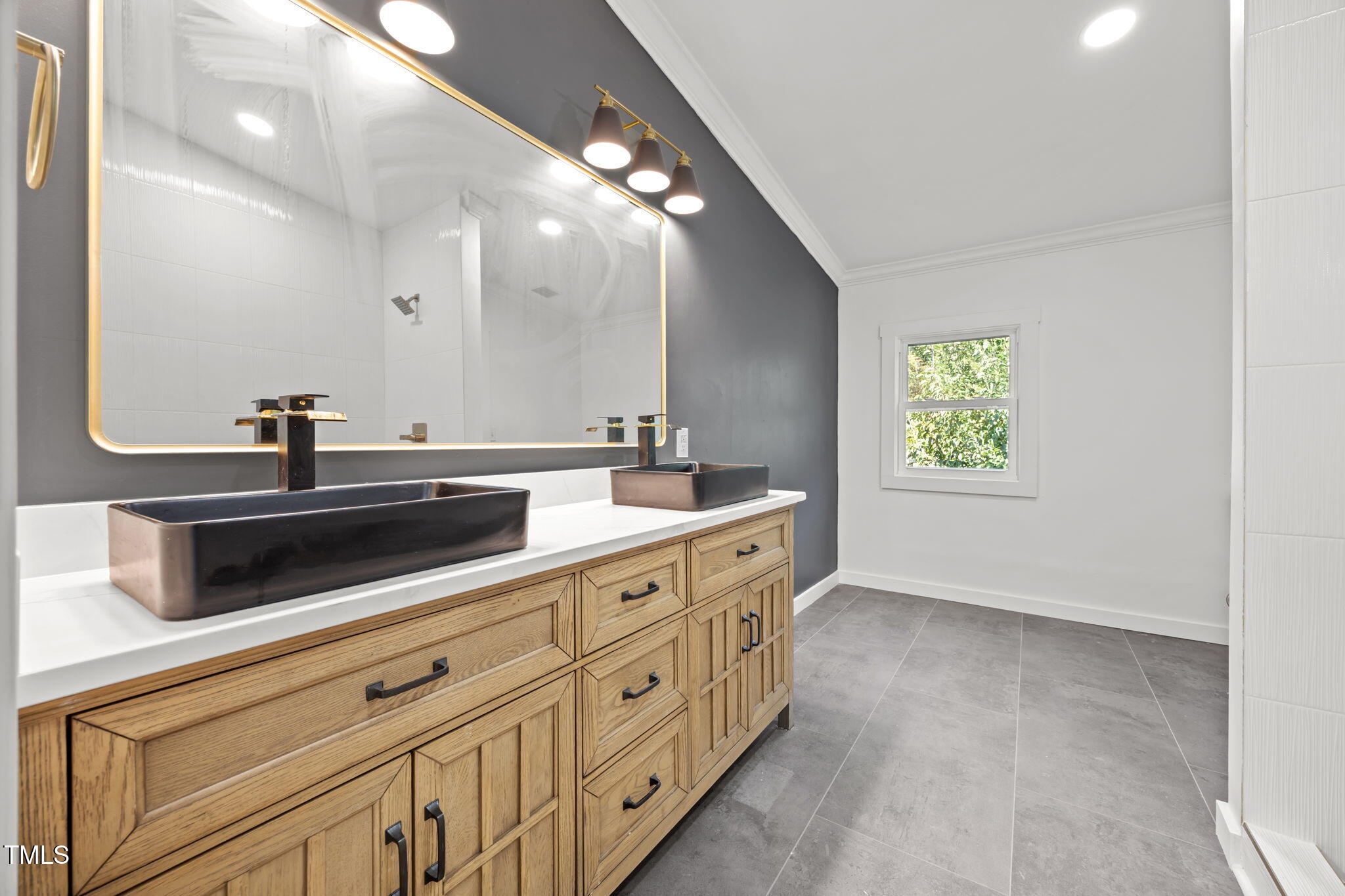 2309 Win Road Garner, NC 27529 - Photo 17 of 35 a bathroom with a sink and a mirror