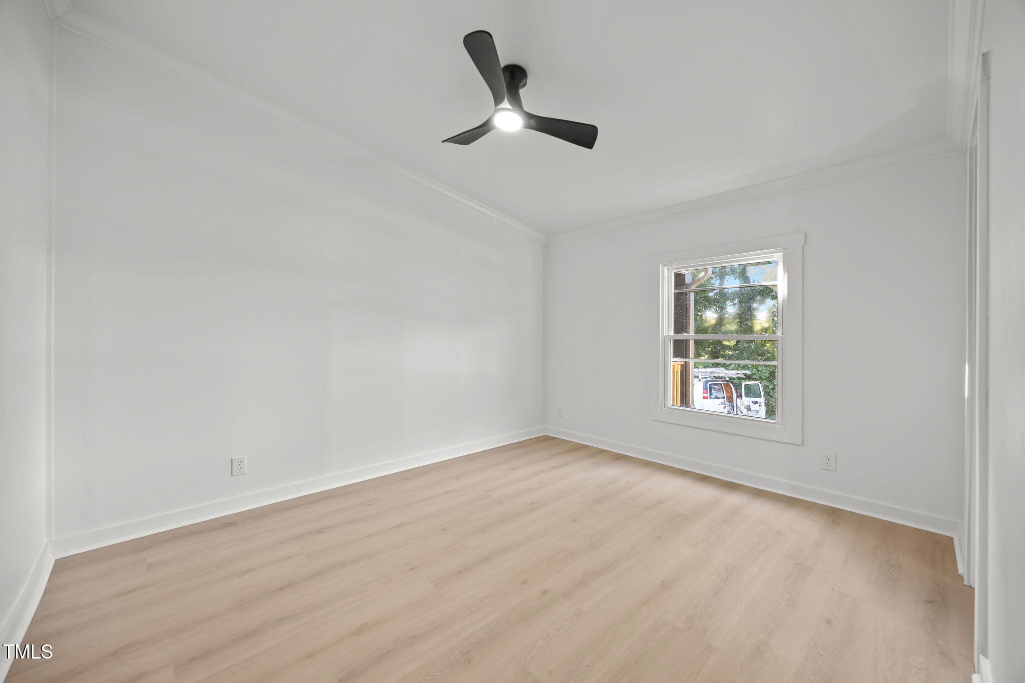 2309 Win Road Garner, NC 27529 - Photo 26 of 35 wooden floor in an empty room with a window