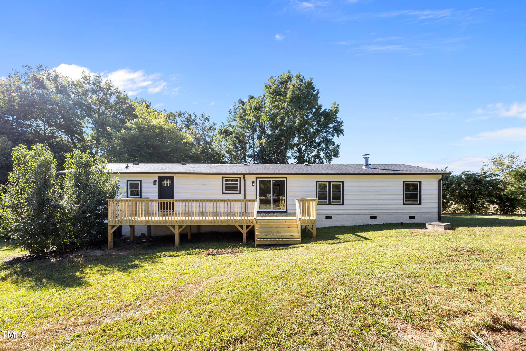 2309 Win Road Garner, NC 27529 - Photo 29 of 35 a view of a house with swimming pool in front of it