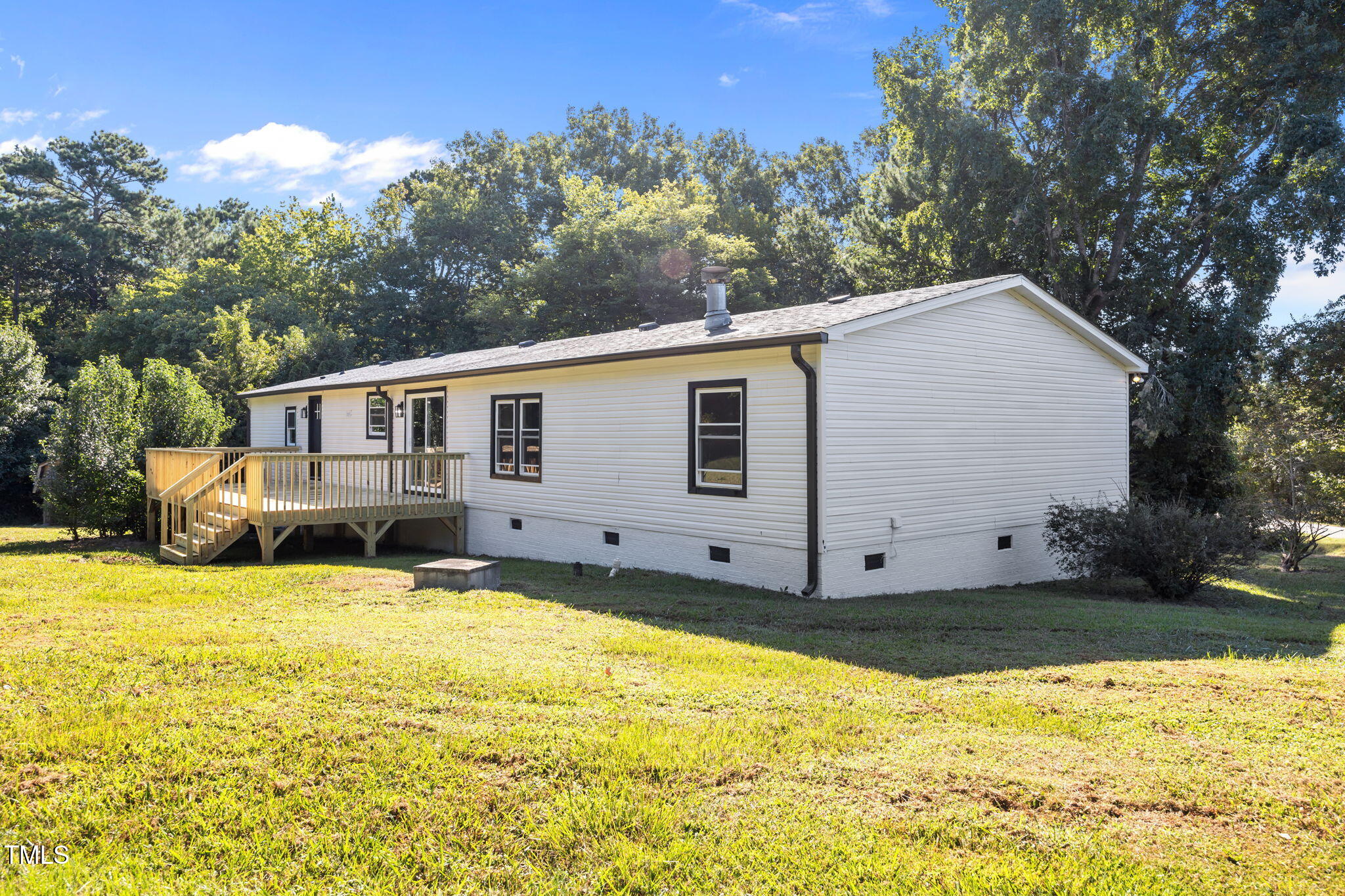 2309 Win Road Garner, NC 27529 - Photo 30 of 35 a view of a house with pool and yard