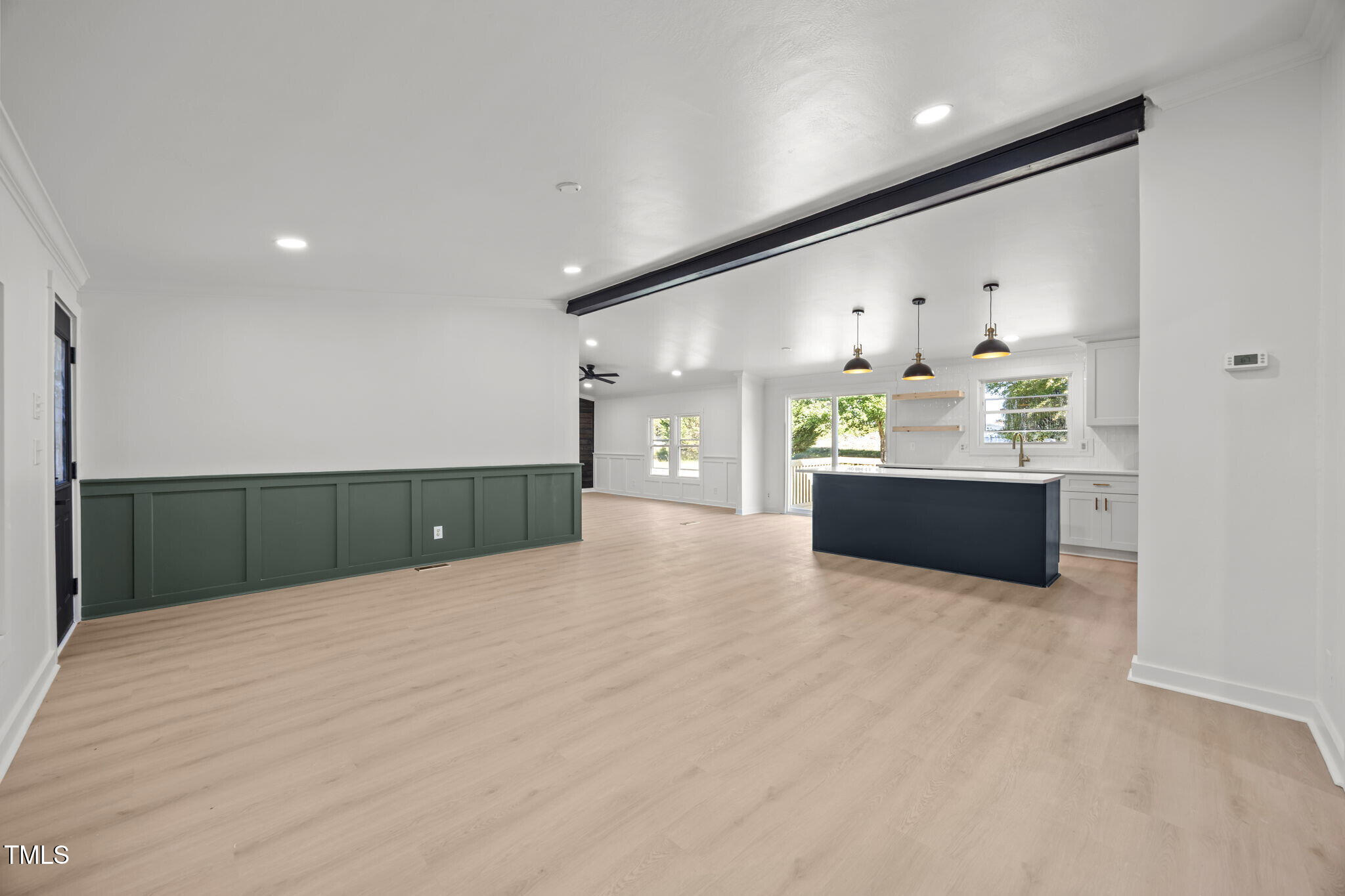 2309 Win Road Garner, NC 27529 - Photo 3 of 35 a view of kitchen and hall with a sink