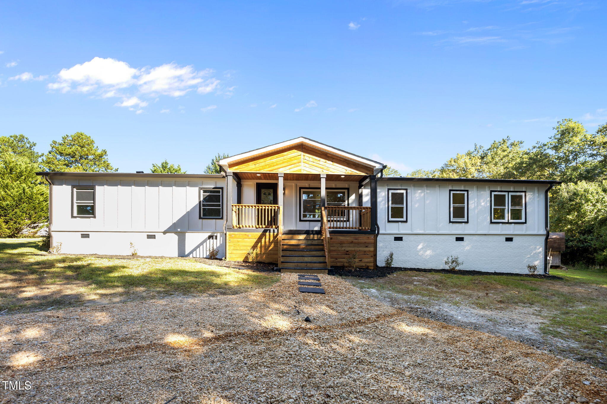 2309 Win Road Garner, NC 27529 - Photo 32 of 35 a view of a house with backyard and sitting area