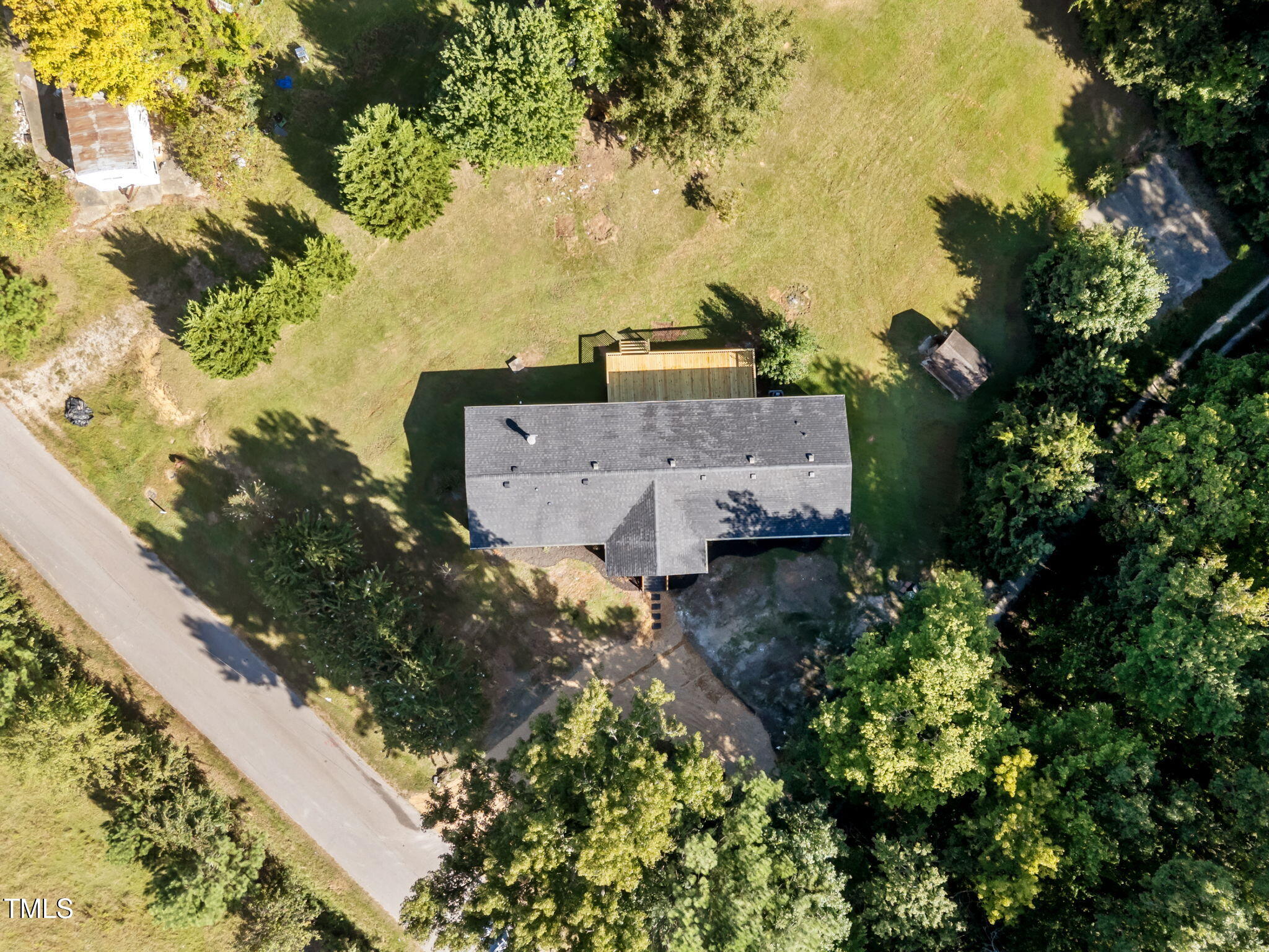 2309 Win Road Garner, NC 27529 - Photo 33 of 35 an aerial view of a house with a yard