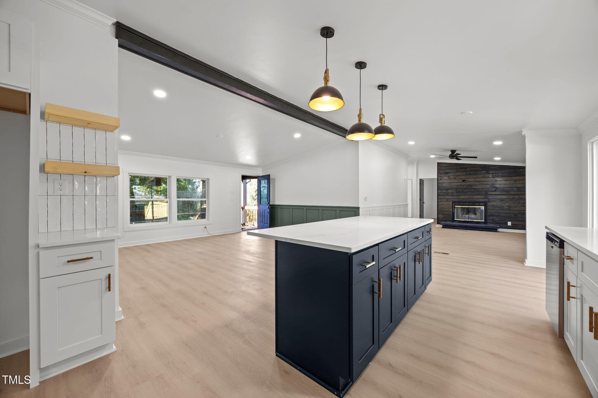 2309 Win Road Garner, NC 27529 - Photo 6 of 35 a kitchen with stainless steel appliances granite countertop a refrigerator a stove and a wooden floors