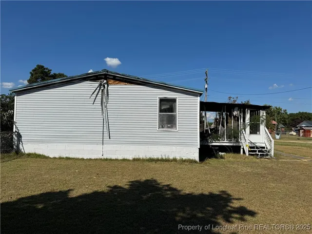 a house view with a garden space