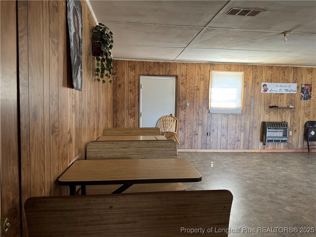 151 Ratley Street Raeford, NC 28376 - Photo 20 of 25 a view of a hallway with seating area