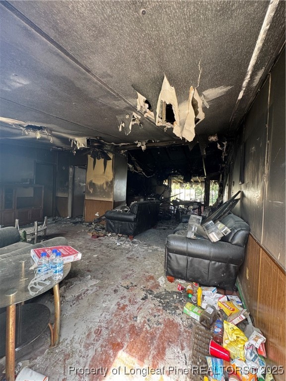151 Ratley Street Raeford, NC 28376 - Photo 8 of 25 a living room with furniture and a fireplace