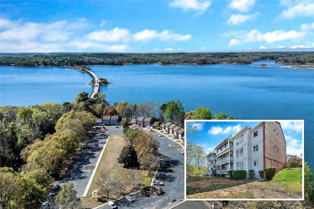 This elevated view captures a serene lake views in sail boat waters. located right across from Portman Marina and close to shopping