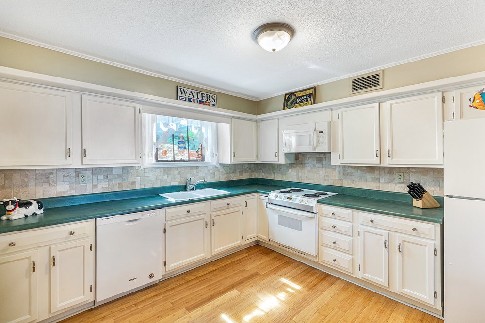 21 Harbor Gate Anderson, SC 29625 - Photo 18 of 44 Bright and functional kitchen featuring ample cabinetry and a practical layout.
