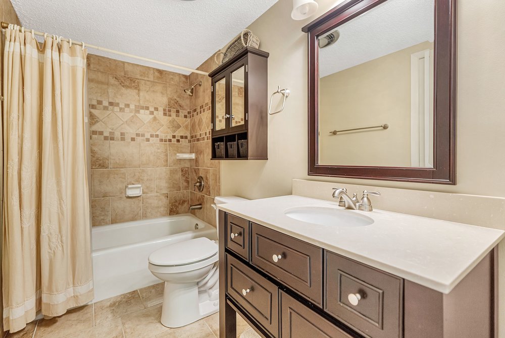 21 Harbor Gate Anderson, SC 29625 - Photo 24 of 44 This bathroom features a contemporary vanity with a spacious countertop and an inviting shower-tub combination.