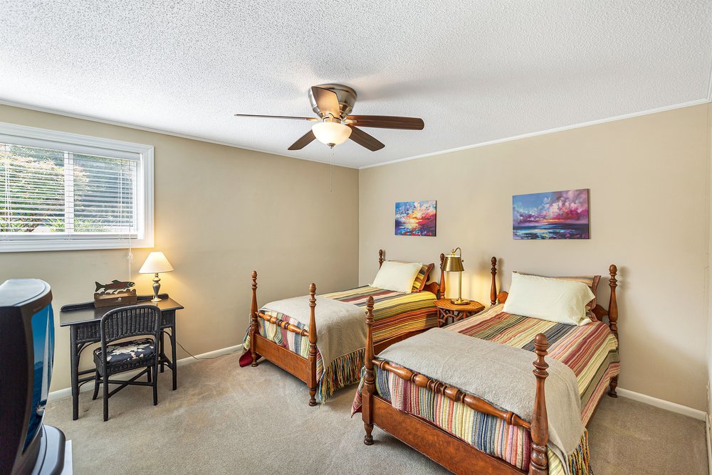 21 Harbor Gate Anderson, SC 29625 - Photo 25 of 44 This cozy bedroom features comfortable beds, soft carpet flooring, and a large window providing ample natural light.