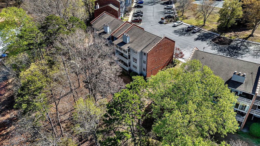 21 Harbor Gate Anderson, SC 29625 - Photo 43 of 44 This residential complex blends seamlessly with its natural surroundings, offering a serene living environment.