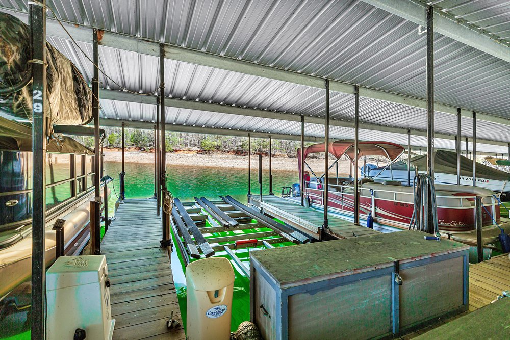 21 Harbor Gate Anderson, SC 29625 - Photo 5 of 44 Boat slip 27 - This serene dock offers direct water access, ideal for leisure and water activities.