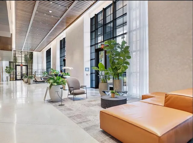 a view of an outdoor dining space with a patio