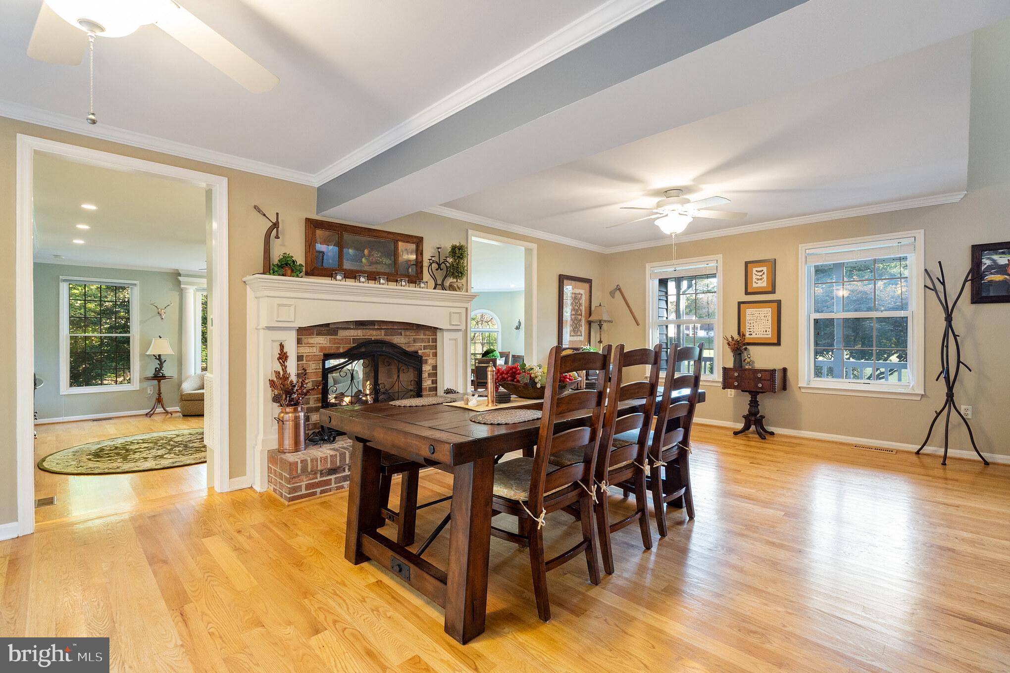 1965 Kings Landing Road Huntingtown, MD 20639 - Photo 16 of 46 Beautiful double-sided fireplace in dining area