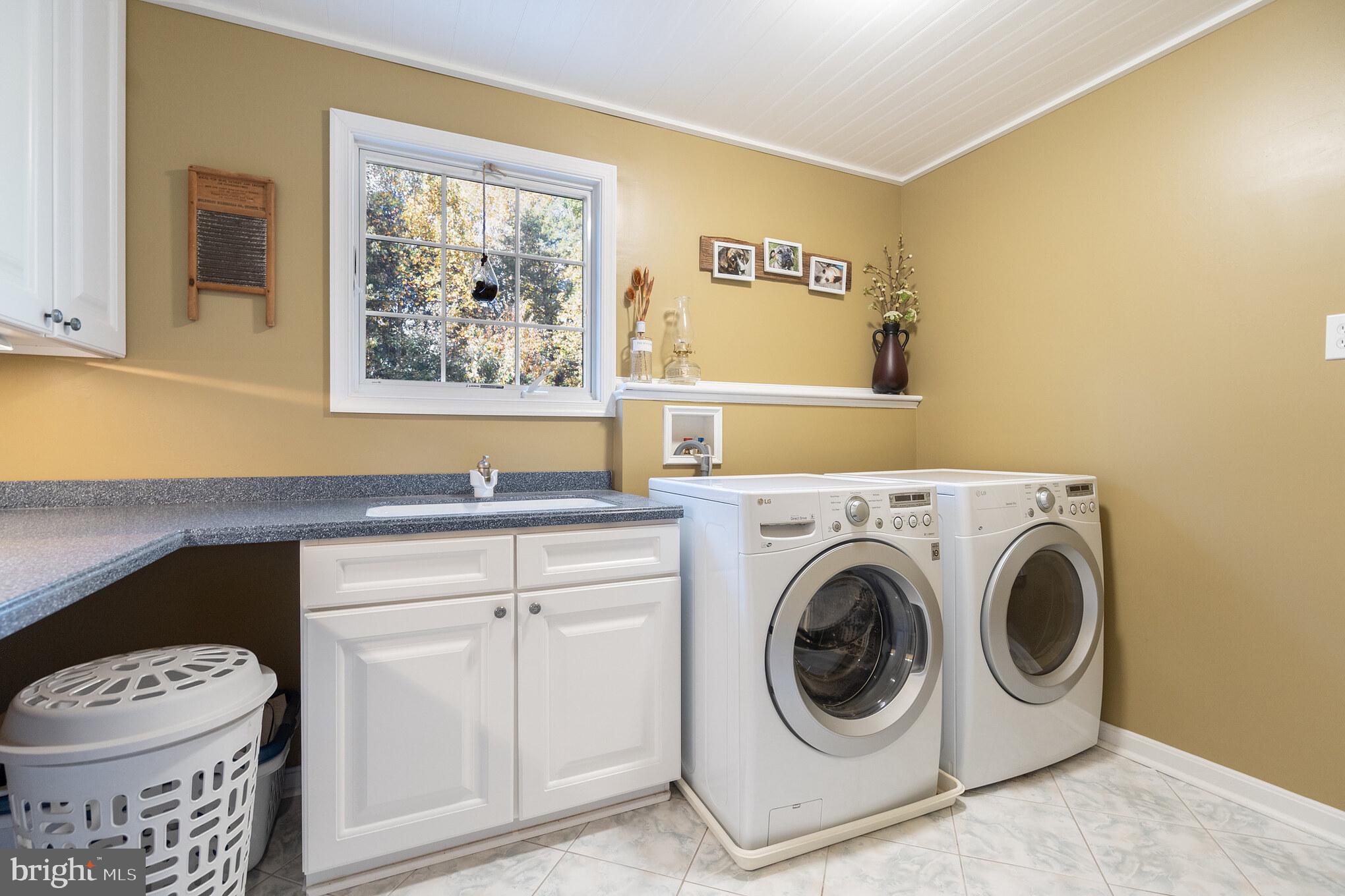 1965 Kings Landing Road Huntingtown, MD 20639 - Photo 25 of 46 Laundry center with great storage, ironing space.