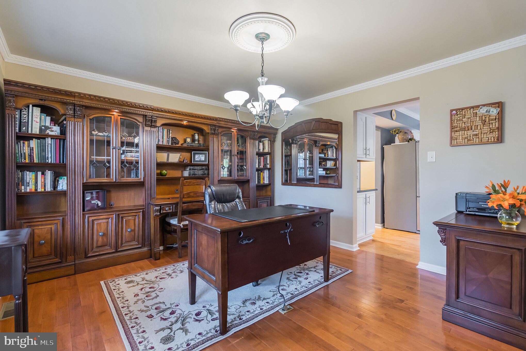 Office to left of entry, then into kitchen.