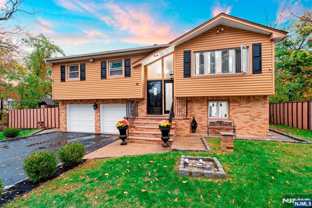 88 Hinchman Avenue Wayne, NJ 07470 - Photo 19 of 37 a front view of a house with garden