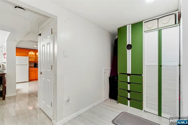 a view of entryway with a rug and a window