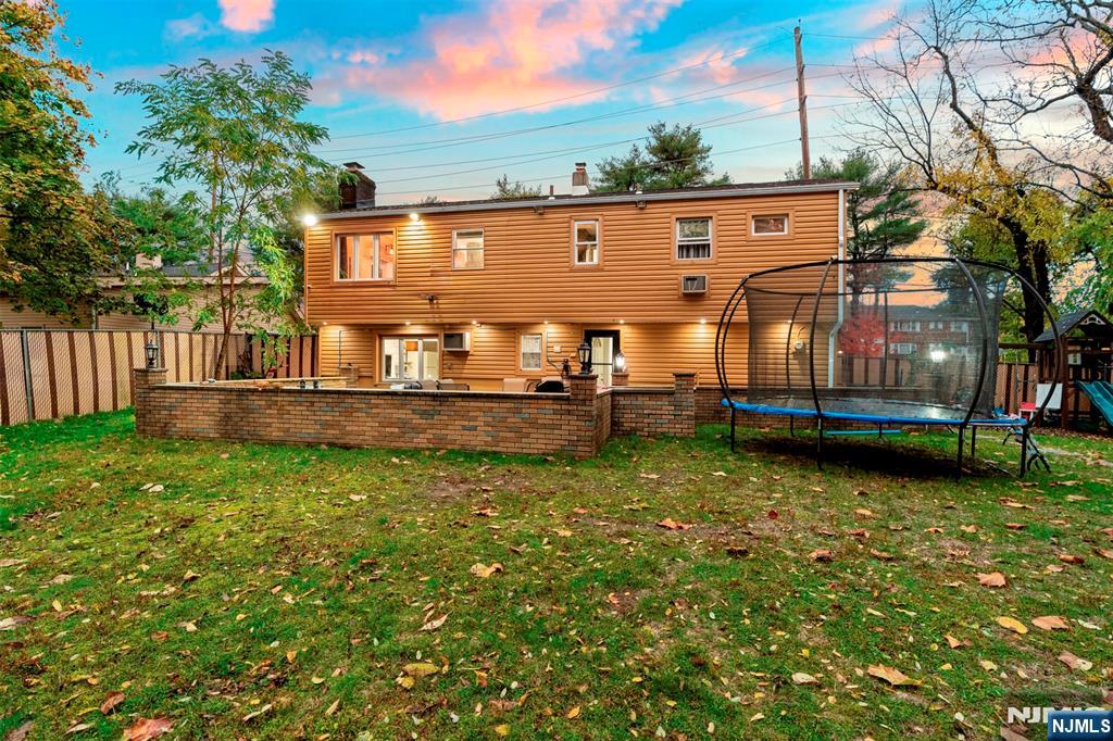 88 Hinchman Avenue Wayne, NJ 07470 - Photo 28 of 37 a backyard of a house with lots of green space