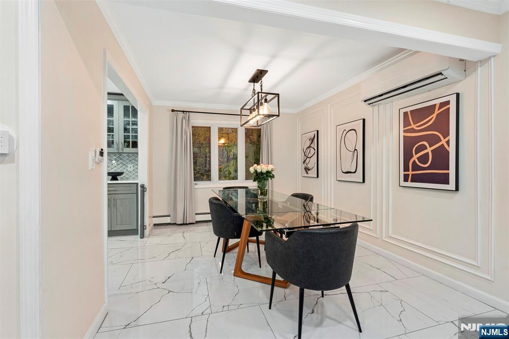 88 Hinchman Avenue Wayne, NJ 07470 - Photo 7 of 37 a view of a dining room with furniture