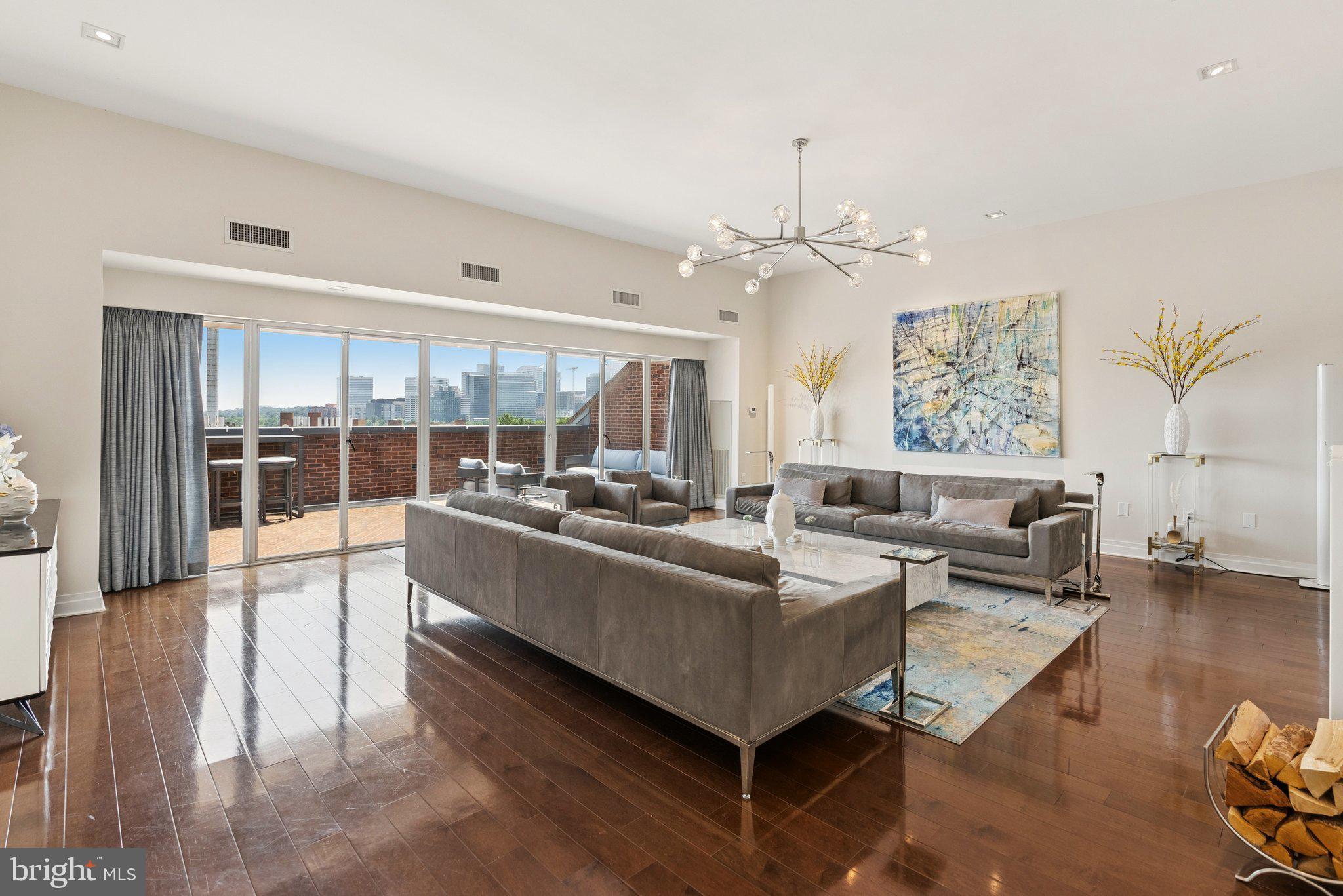3251 Prospect Street Northwest, Unit 402 Washington, DC 20007 - Photo 3 of 36 a living room with furniture and a large window