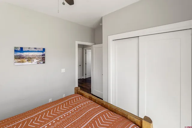 a bathroom with a shower a toilet and a sink