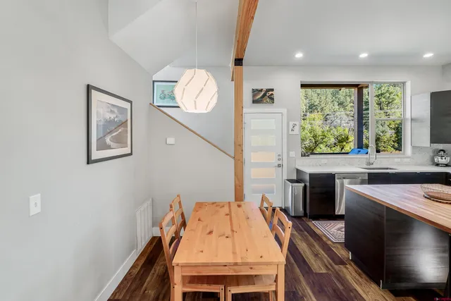 a view of a kitchen with a sink and a microwave