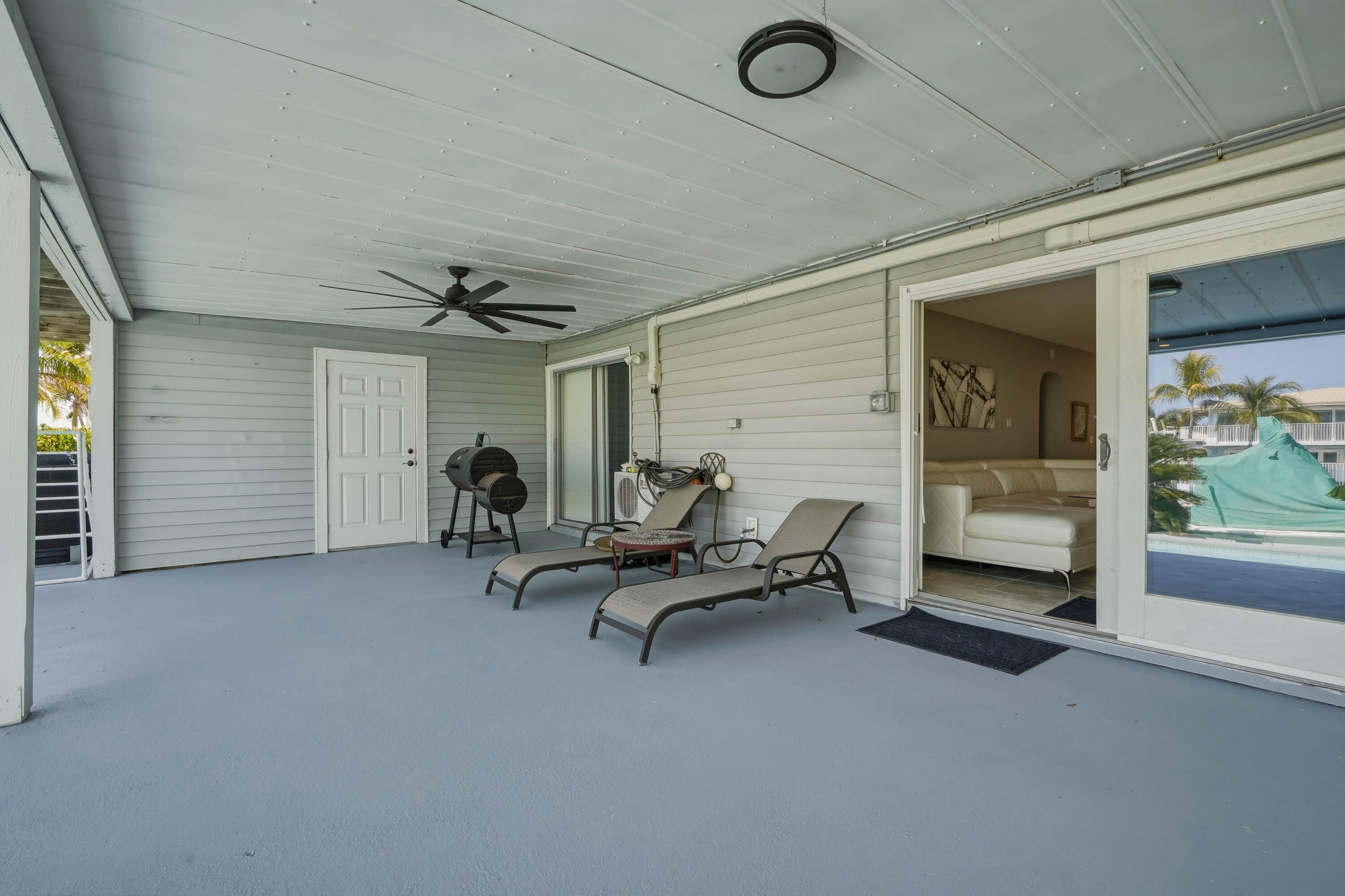 320 5th Street Key Colony Beach, FL 33051 - Photo 43 of 53 a view of a livingroom with furniture and a window