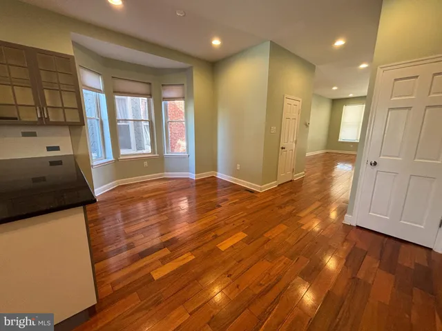 a view of livingroom with hardwood floor and window