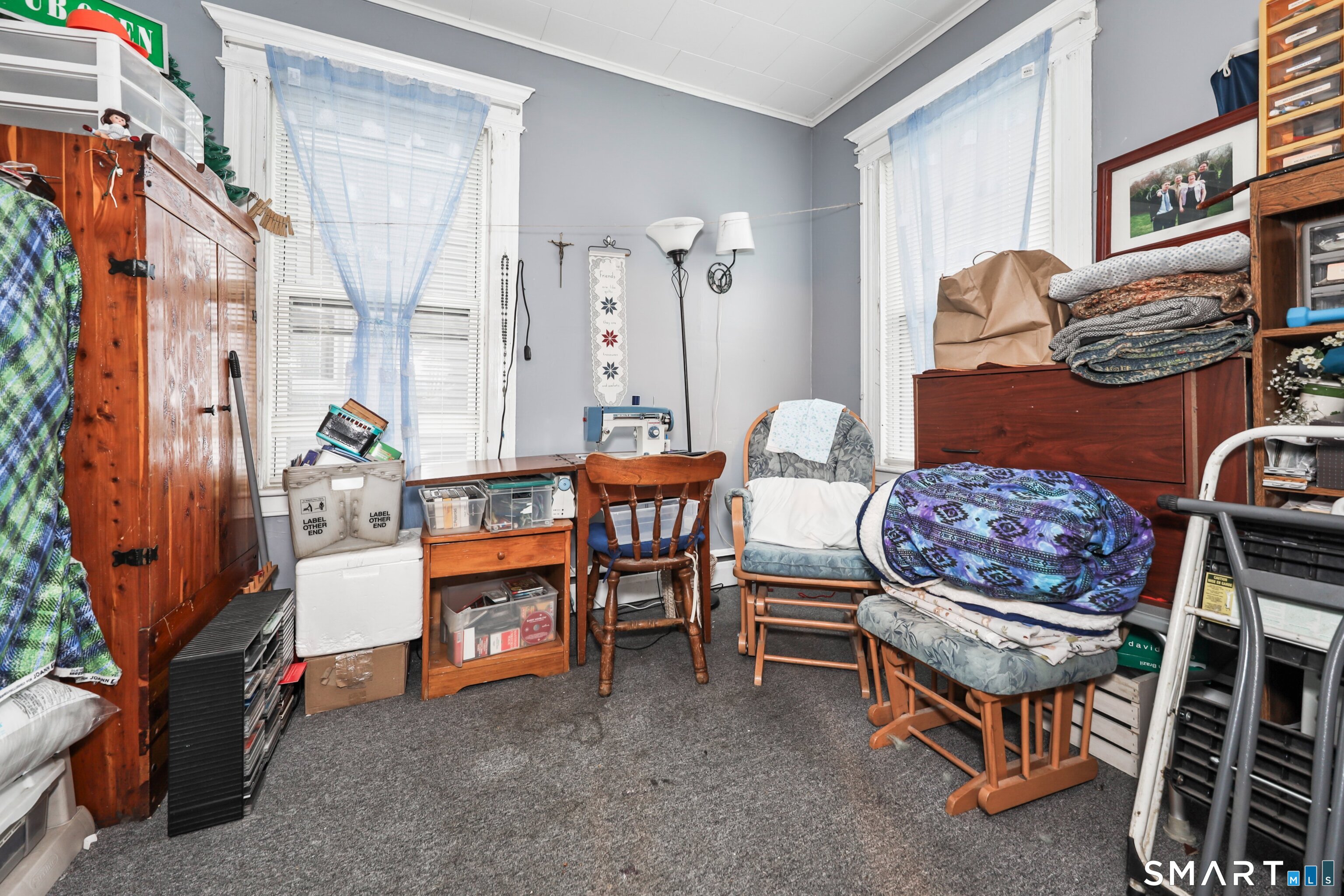 82 Bunker Hill Avenue Waterbury, CT 06708 - Photo 12 of 37 a room with furniture and a fireplace