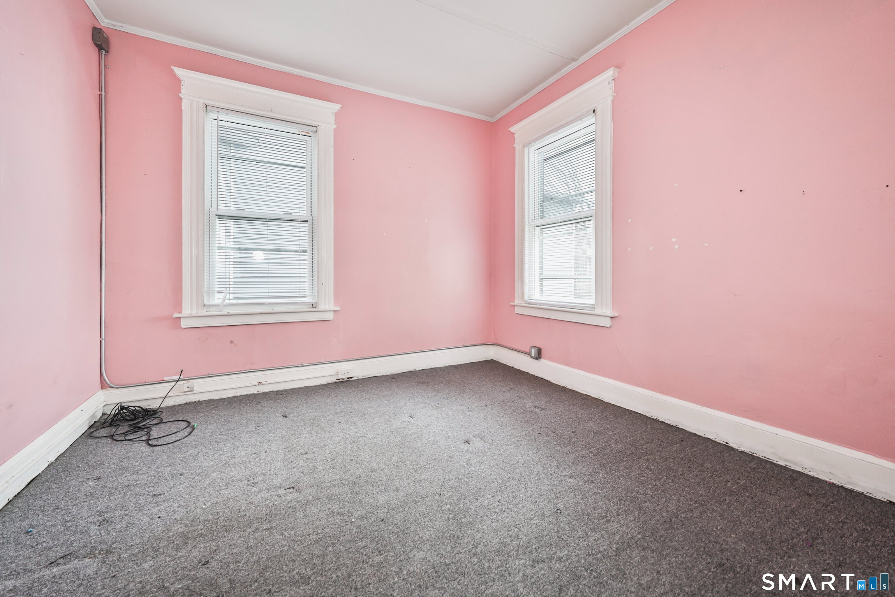 82 Bunker Hill Avenue Waterbury, CT 06708 - Photo 18 of 37 an empty room with windows