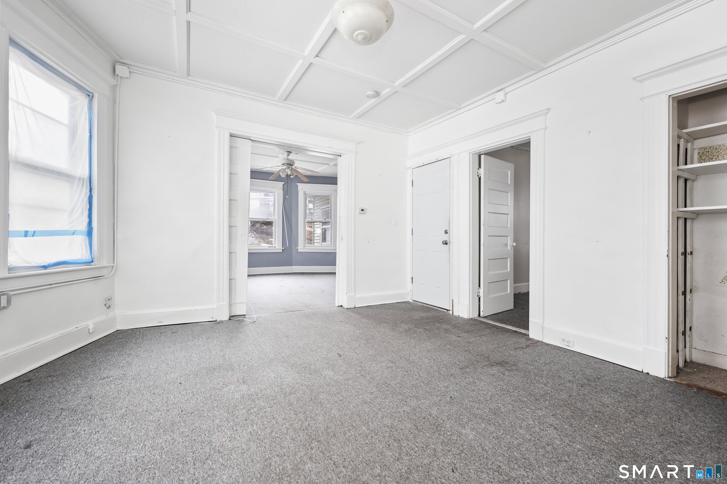 82 Bunker Hill Avenue Waterbury, CT 06708 - Photo 20 of 37 an empty room with windows and closet