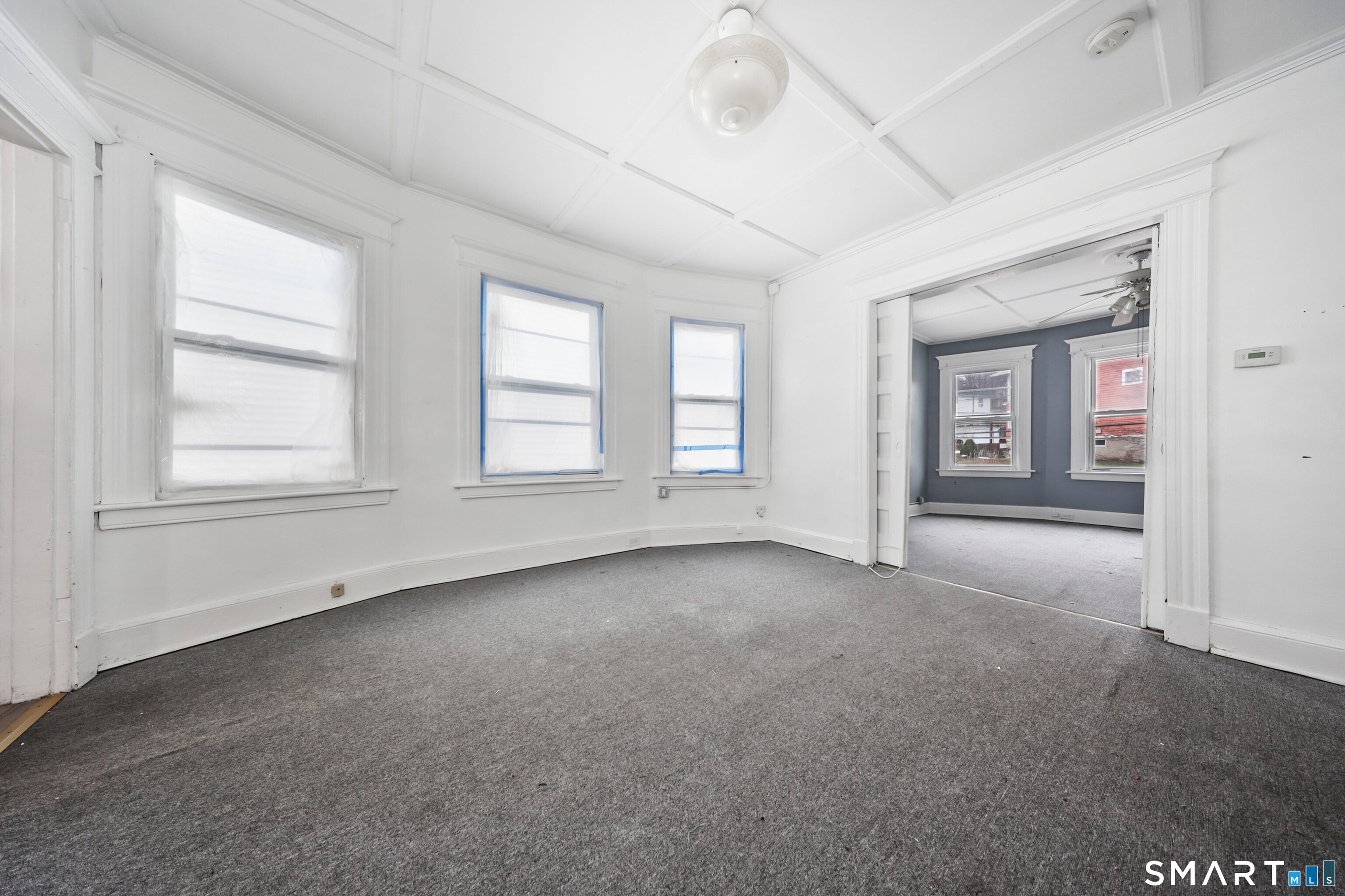 82 Bunker Hill Avenue Waterbury, CT 06708 - Photo 21 of 37 an empty room with windows and closet