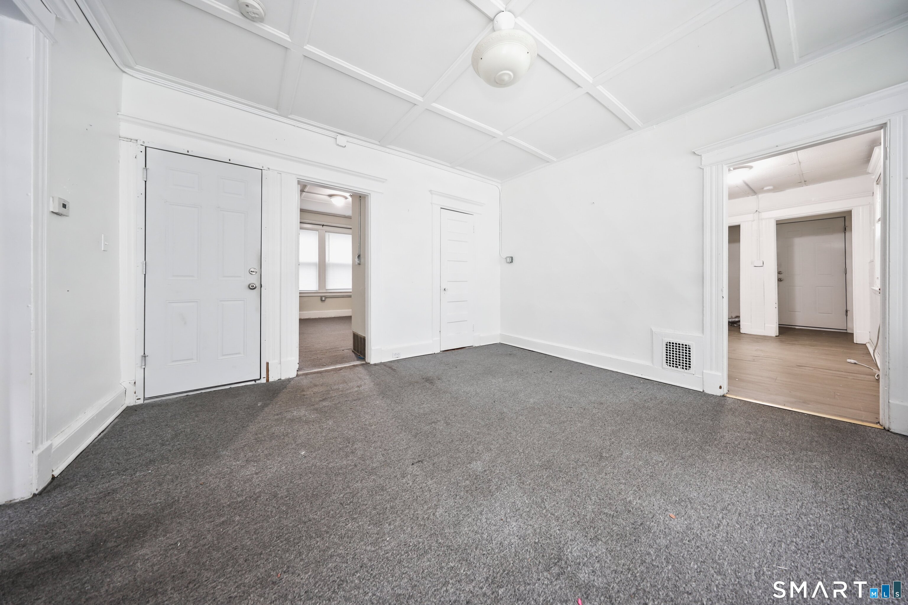 82 Bunker Hill Avenue Waterbury, CT 06708 - Photo 22 of 37 a view of an empty room with closet and a window