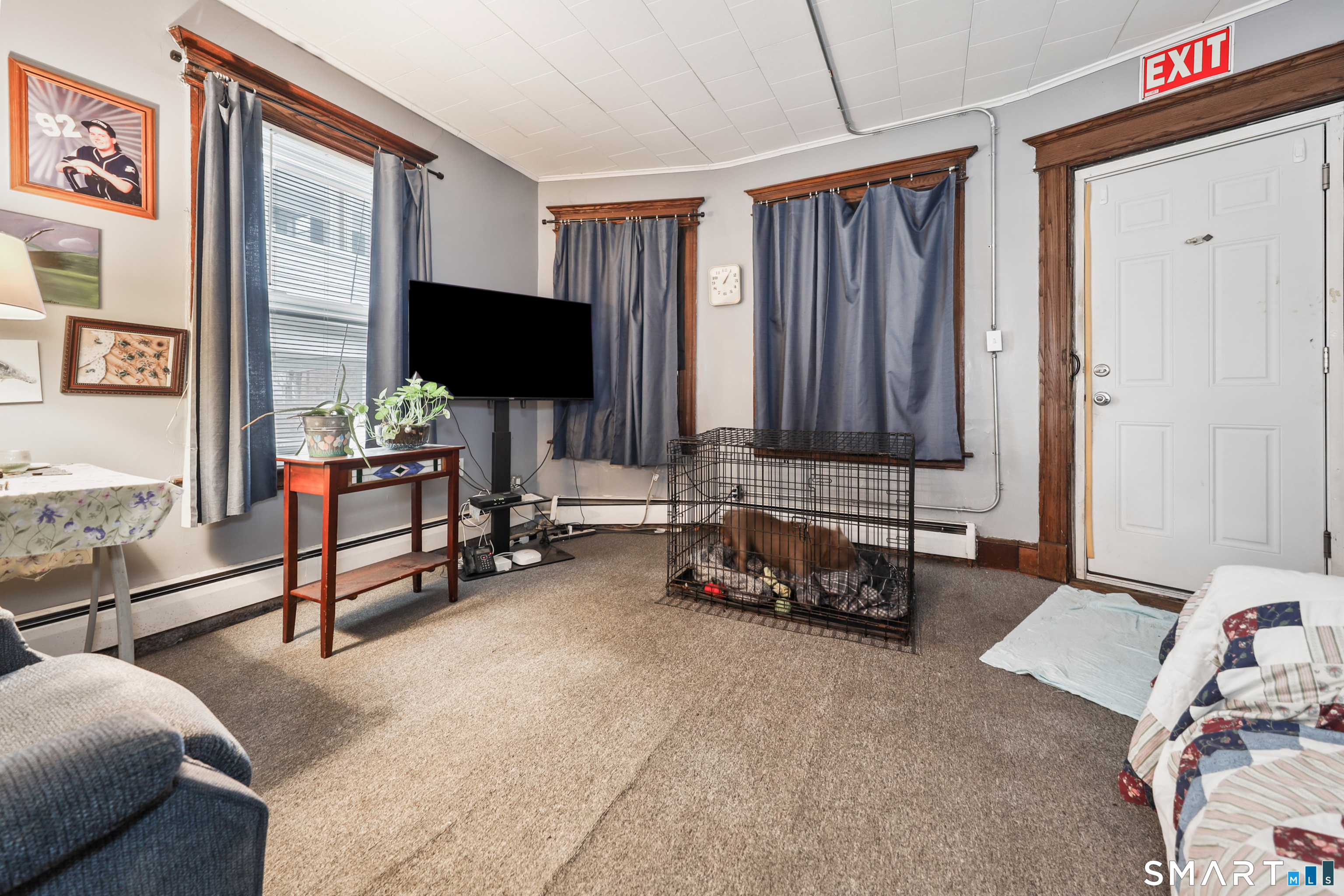 82 Bunker Hill Avenue Waterbury, CT 06708 - Photo 5 of 37 a living room with furniture and a flat screen tv