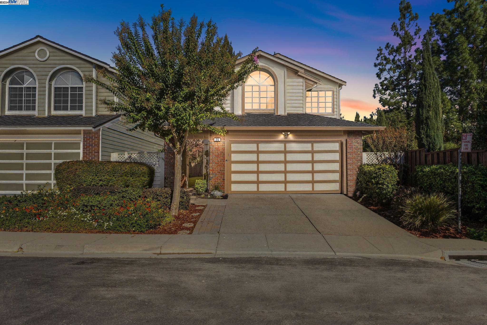 25 Winterside Court San Ramon, CA 94583 - Photo 1 of 1 a front view of a house with a yard and garage