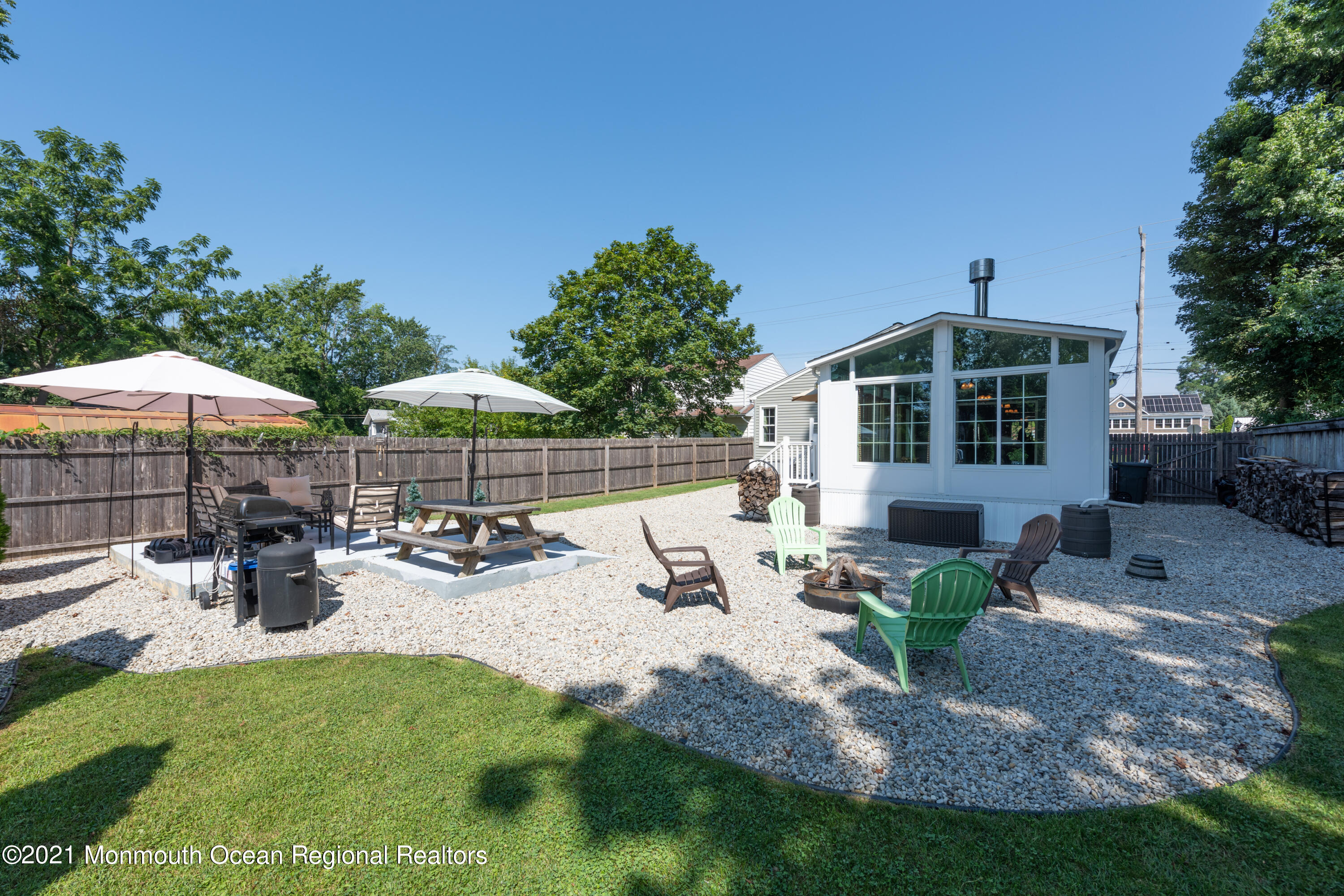 44 White Road Shrewsbury, NJ 07702 - Photo 14 of 16 a view of a house with backyard and sitting area