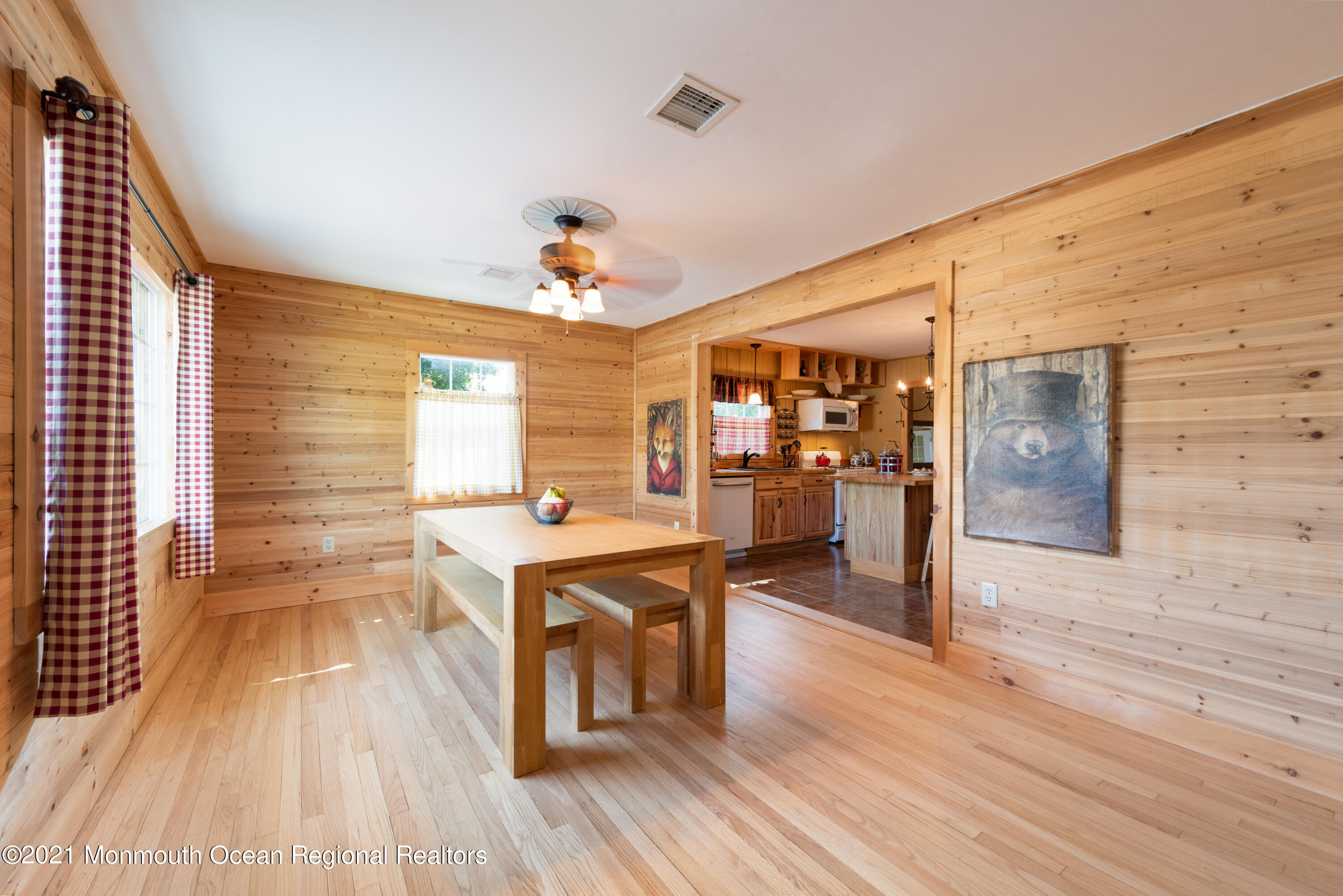 44 White Road Shrewsbury, NJ 07702 - Photo 5 of 16 a view of a kitchen with kitchen island a counter top space a sink and wooden floor