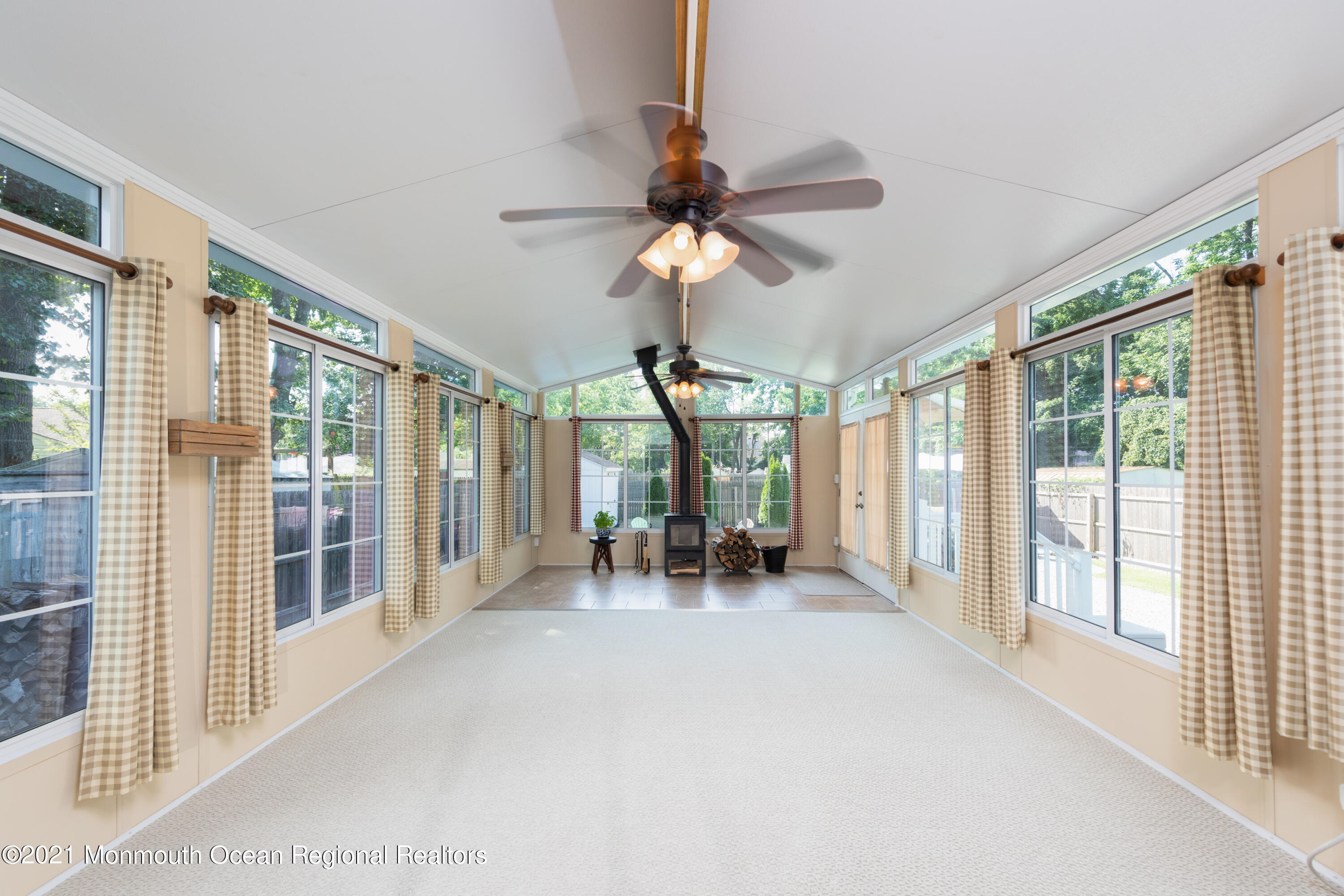 44 White Road Shrewsbury, NJ 07702 - Photo 8 of 16 a view of living room with furniture chandelier and a large window