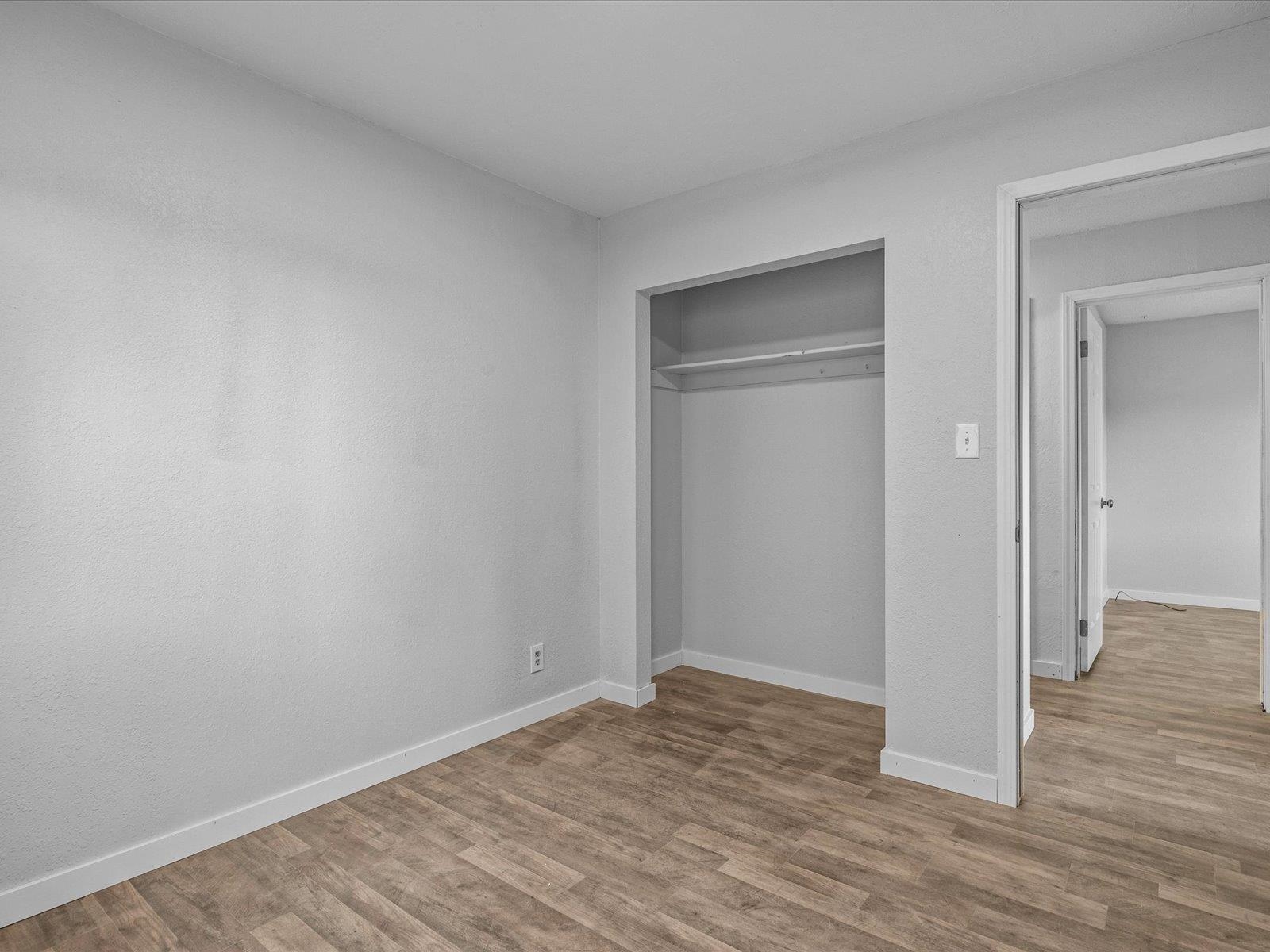 246 East Rangely Avenue Rangely, CO 81648 - Photo 11 of 21 wooden floor in an empty room