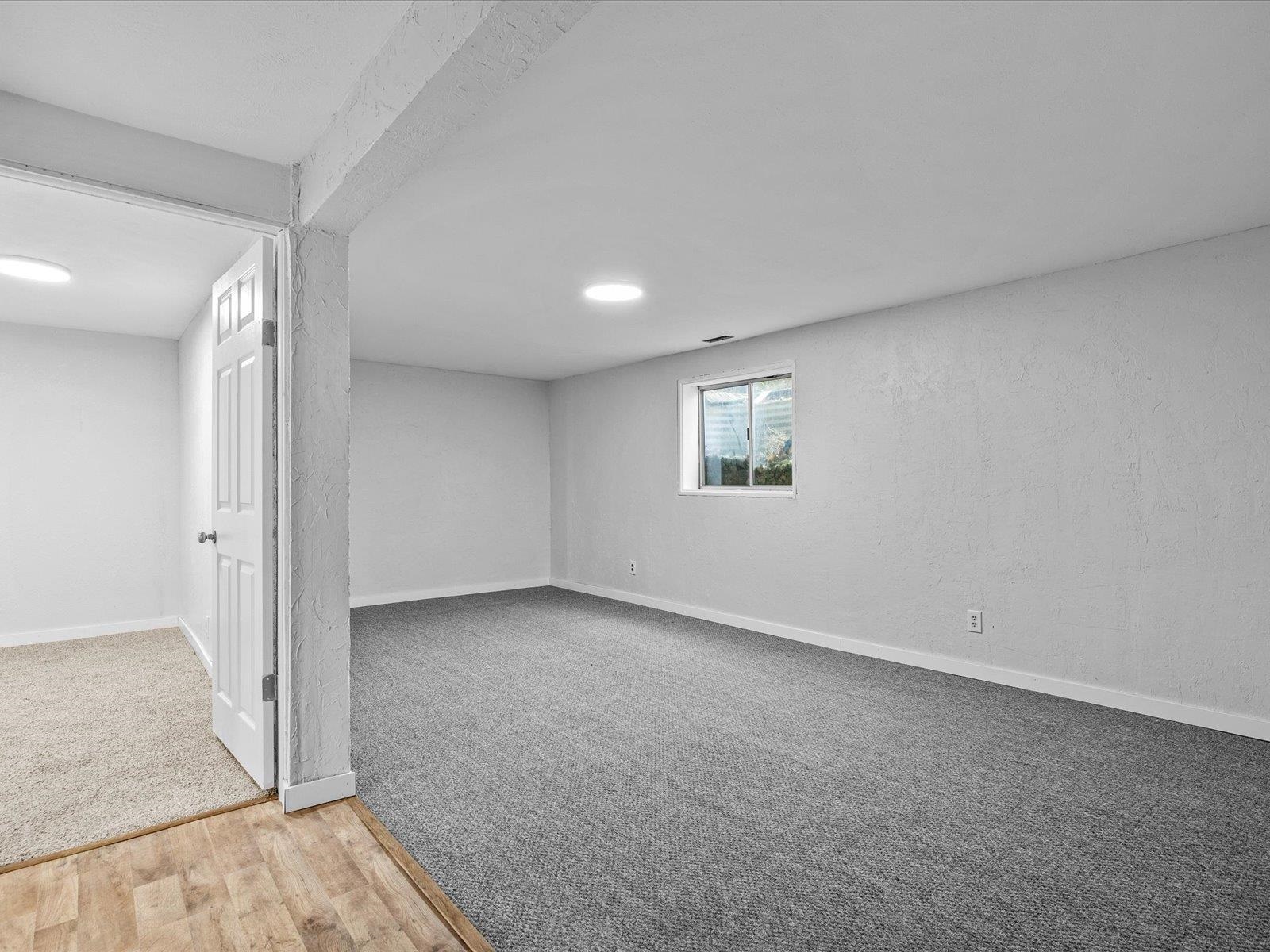 246 East Rangely Avenue Rangely, CO 81648 - Photo 14 of 21 an empty room with a window