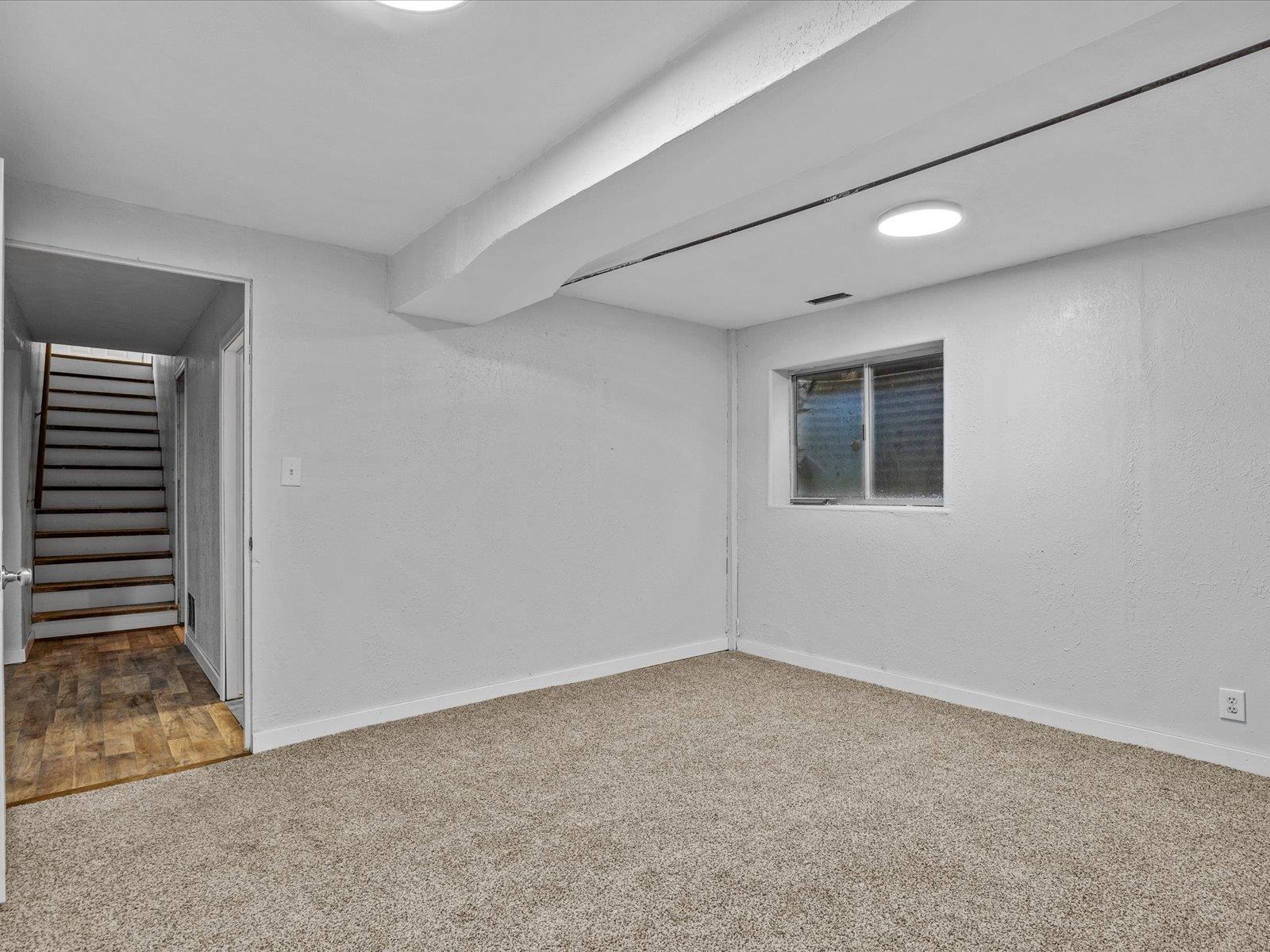 246 East Rangely Avenue Rangely, CO 81648 - Photo 15 of 21 a view of an empty room with a window