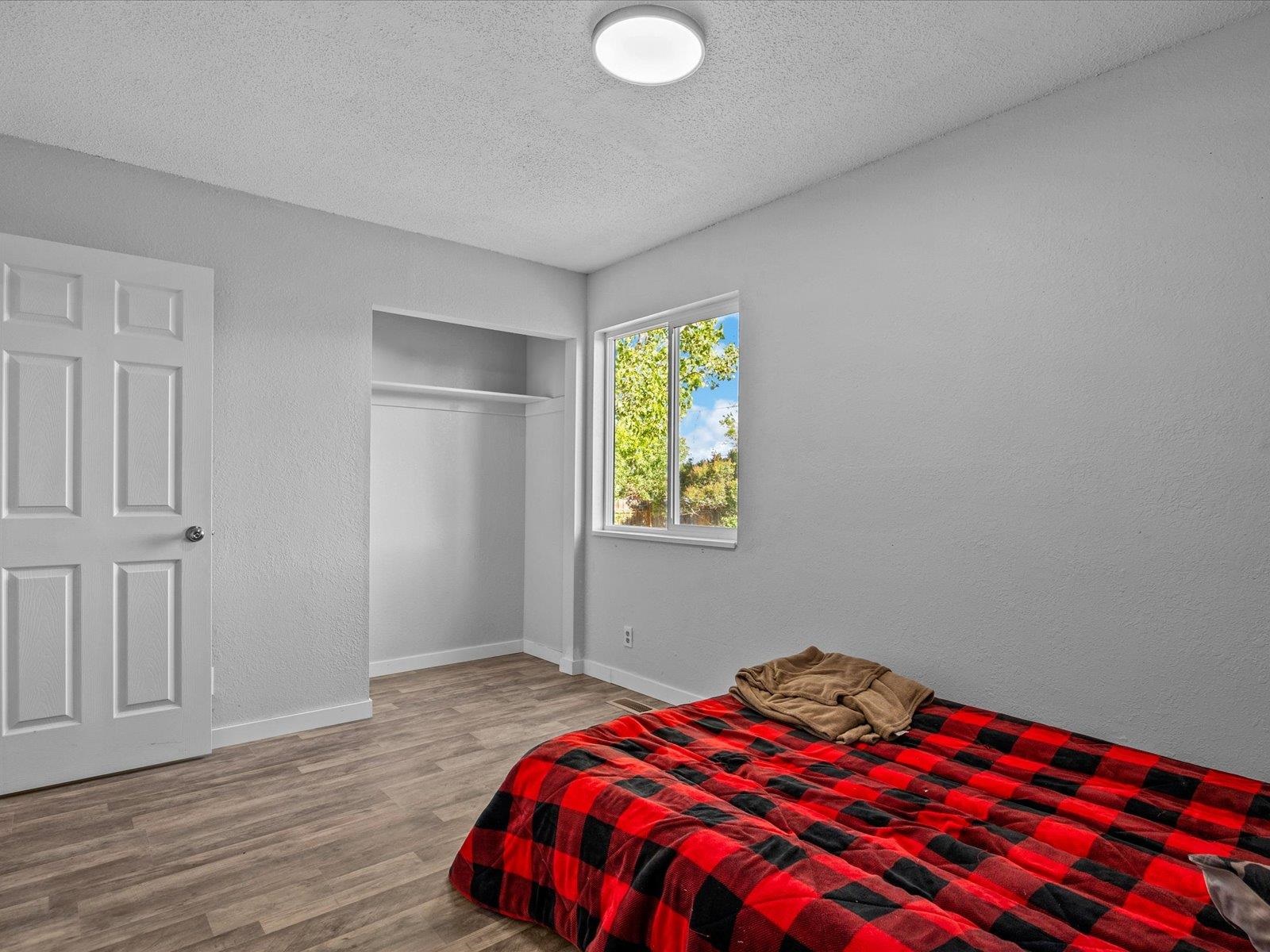 246 East Rangely Avenue Rangely, CO 81648 - Photo 9 of 21 a bedroom with a bed and a window