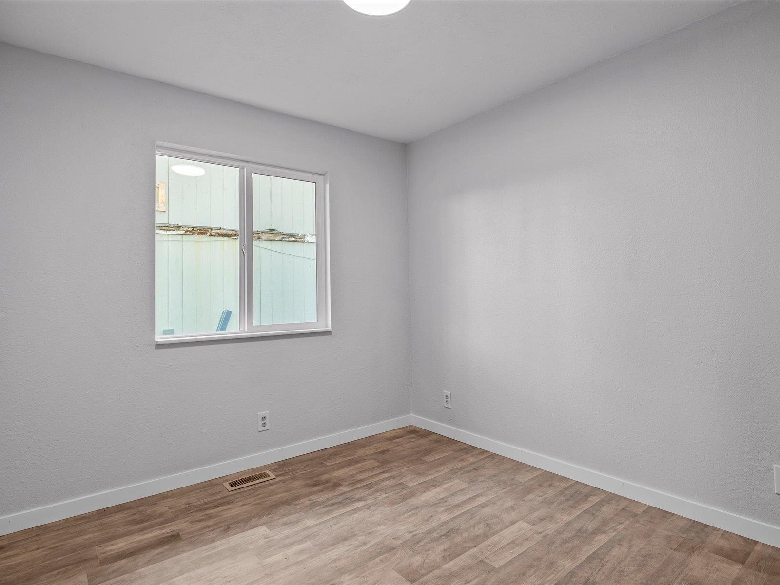 246 East Rangely Avenue Rangely, CO 81648 - Photo 10 of 21 an empty room with a window