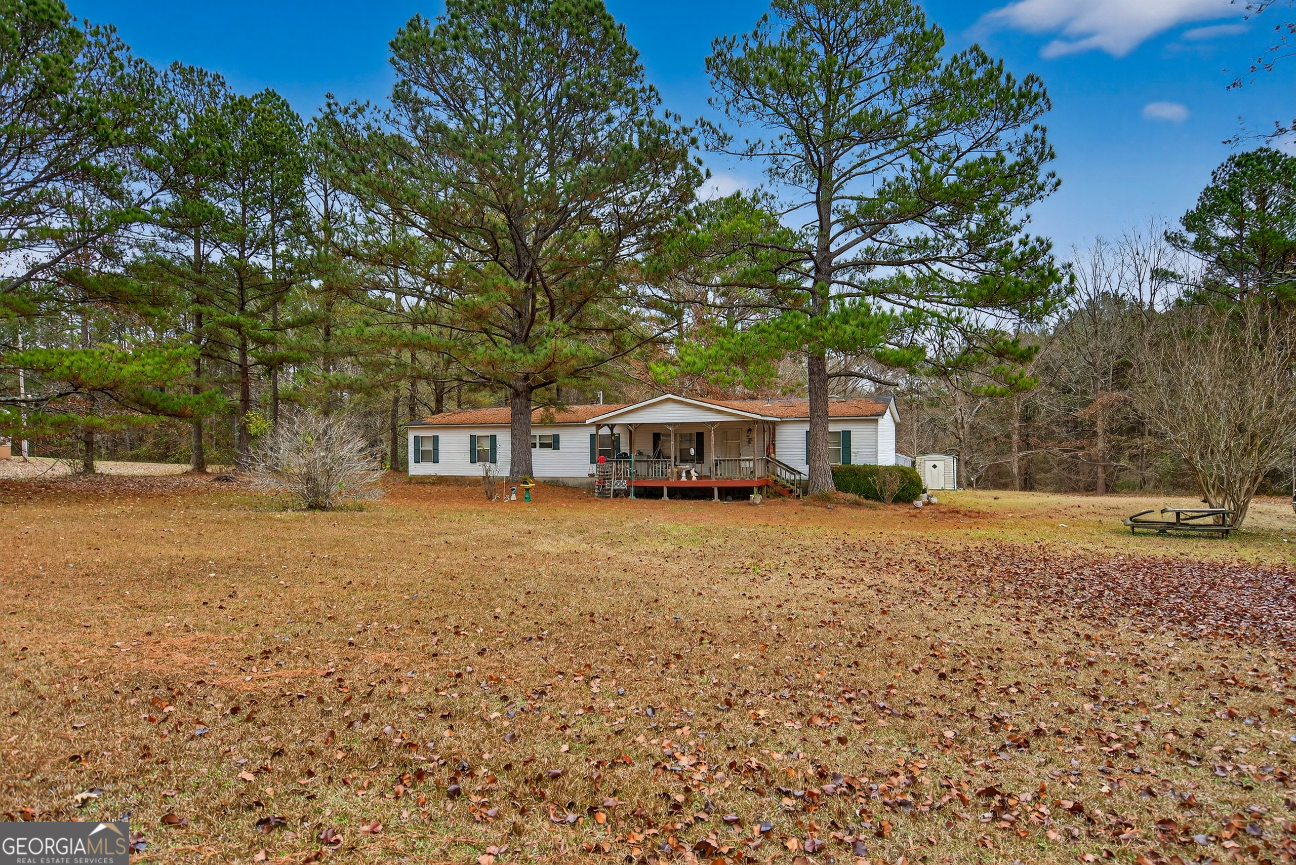 345 Robert Taylor Road LaGrange, GA 30240 - Photo 1 of 15 a front view of a house with a garden