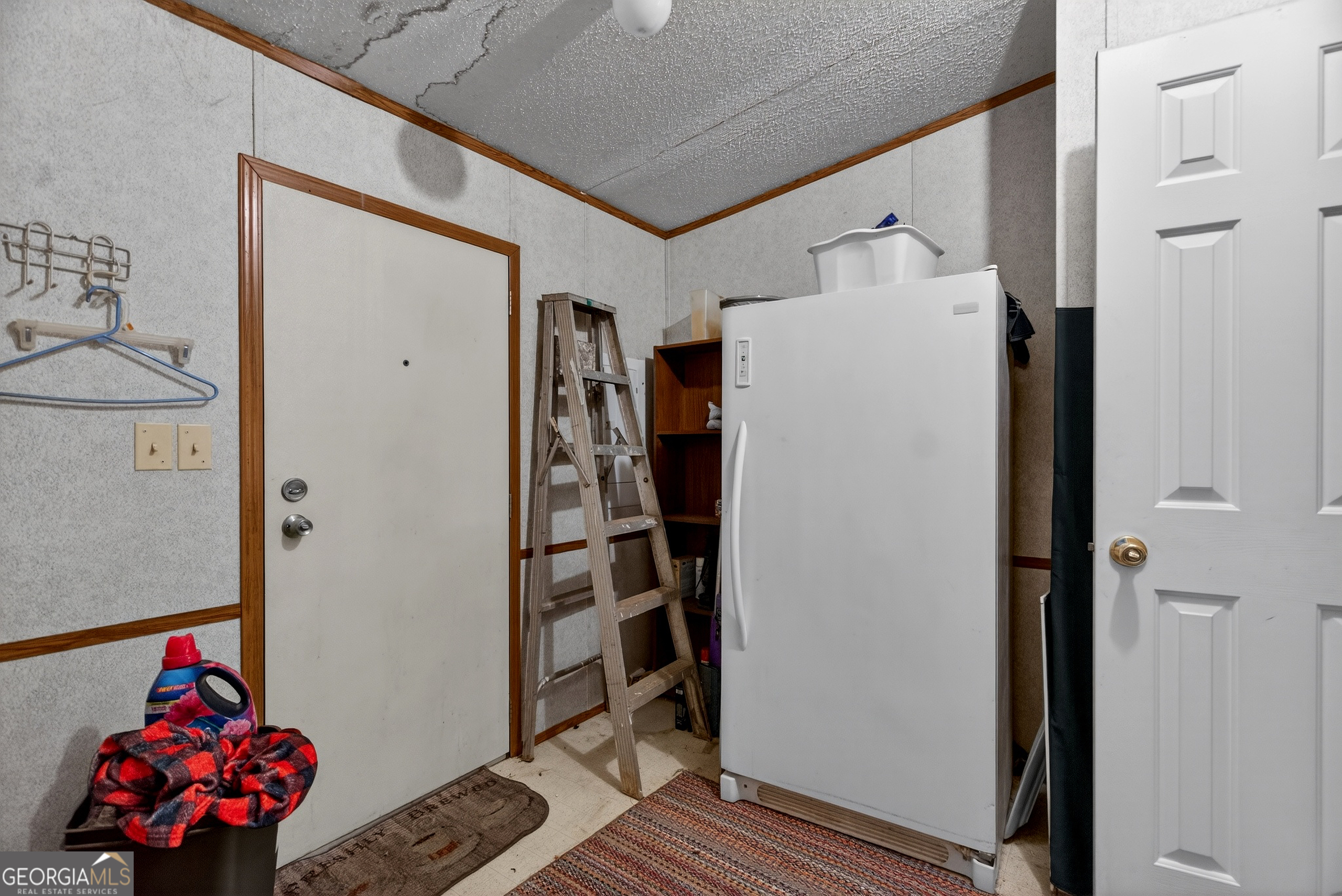 345 Robert Taylor Road LaGrange, GA 30240 - Photo 13 of 15 a white refrigerator freezer sitting inside of a kitchen