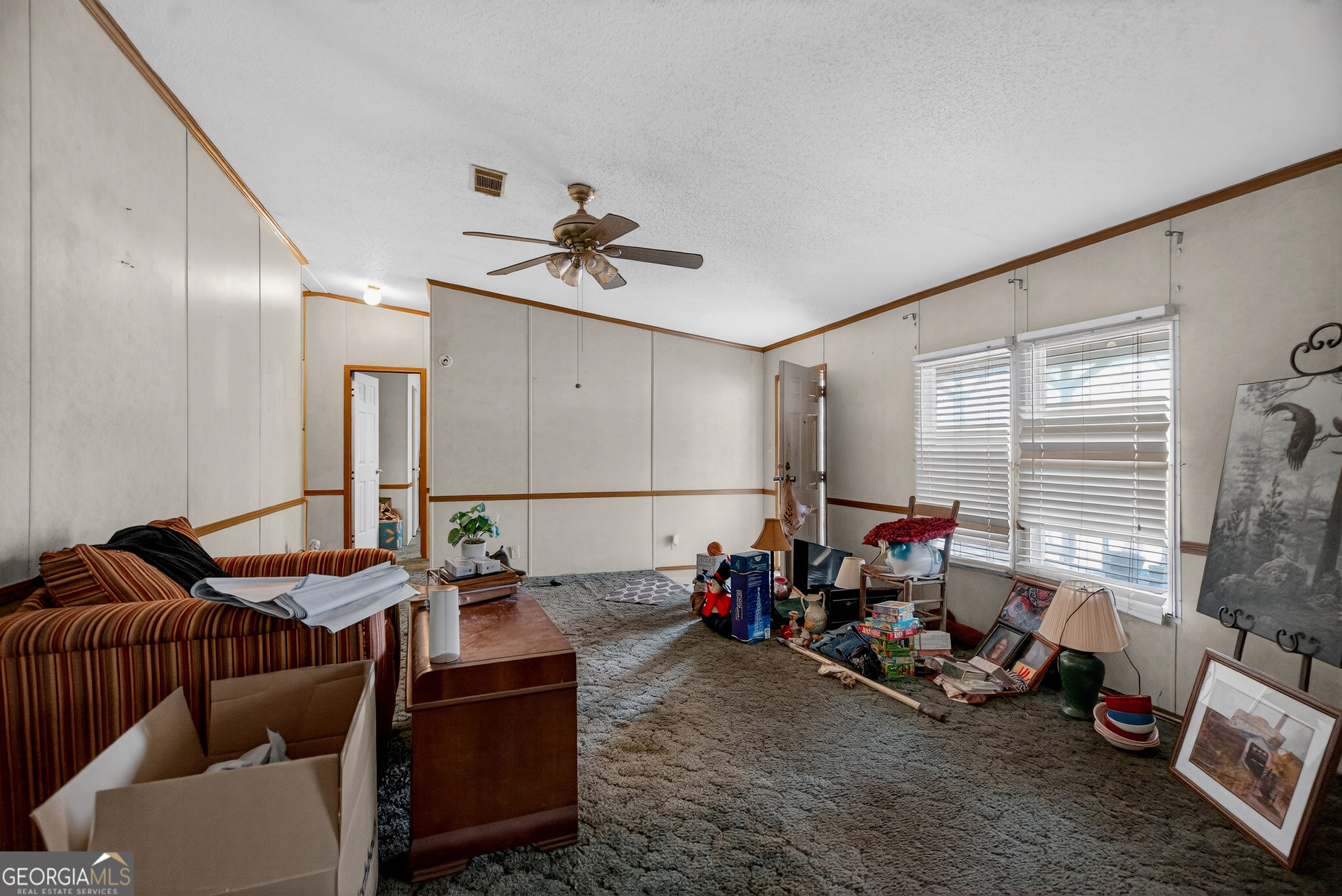 345 Robert Taylor Road LaGrange, GA 30240 - Photo 14 of 15 a living room with furniture and a window
