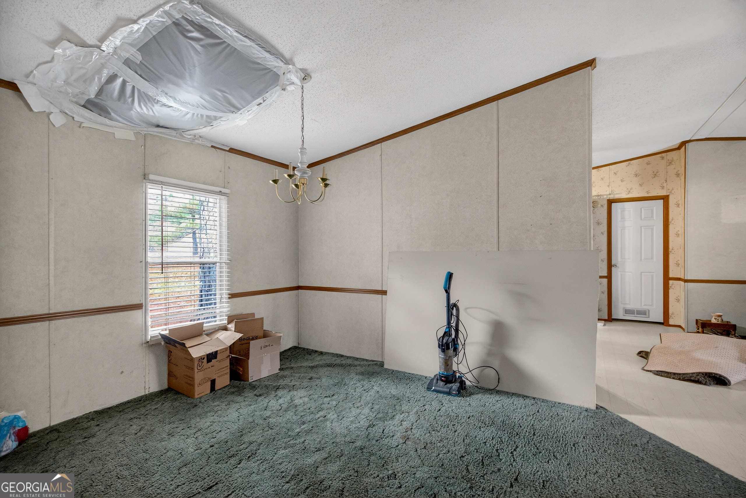 345 Robert Taylor Road LaGrange, GA 30240 - Photo 3 of 15 a view of a room with gym equipment