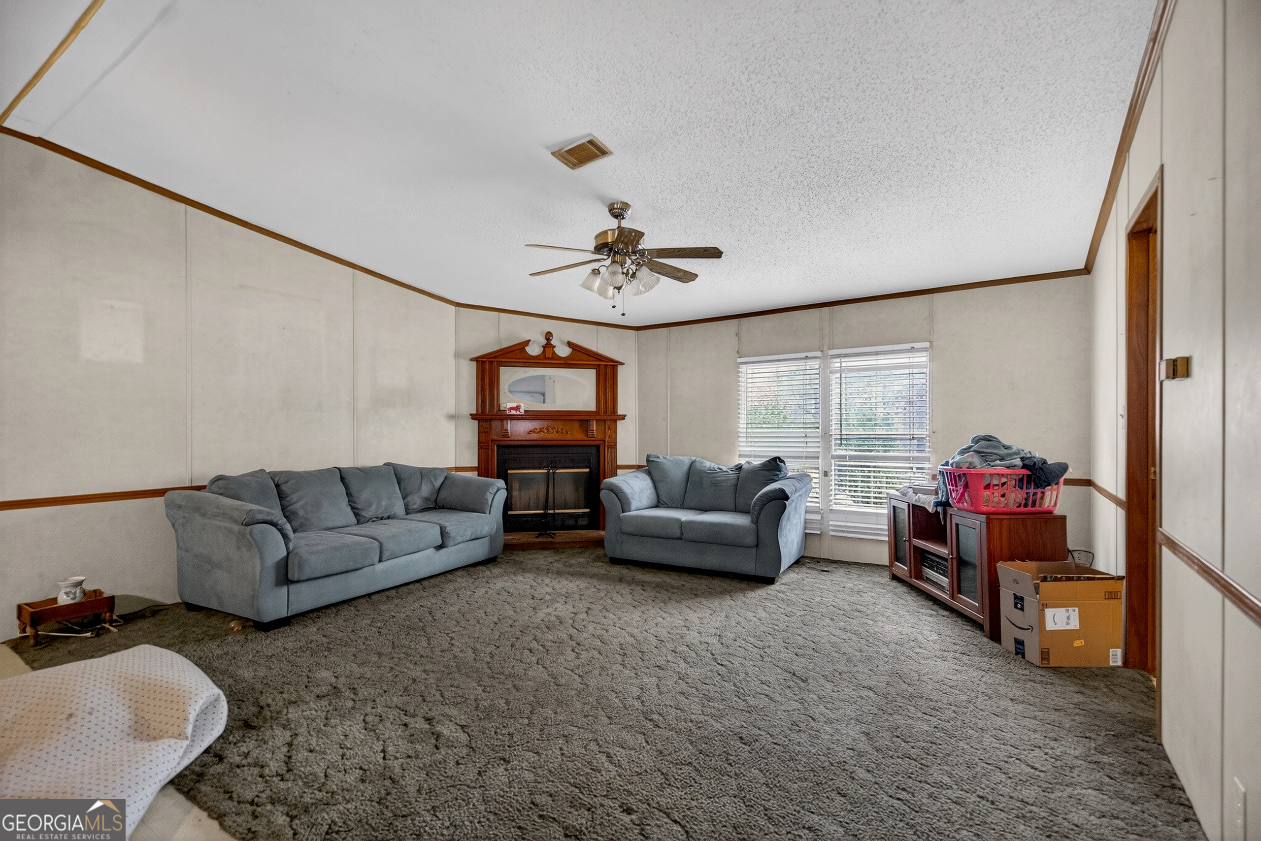345 Robert Taylor Road LaGrange, GA 30240 - Photo 7 of 15 a living room with furniture and a window